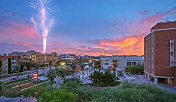 Sunset view of UA Campus with Fireworks in the Distance