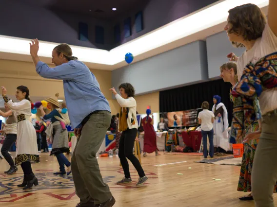 Coverdell Fellows dancing at Peace Corps Fair