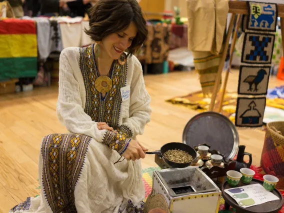 Fellow performing a coffee ceremony at Peace Corps Fair