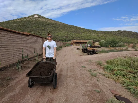 Coverdell Fellows fertilize crops at Mission Garden