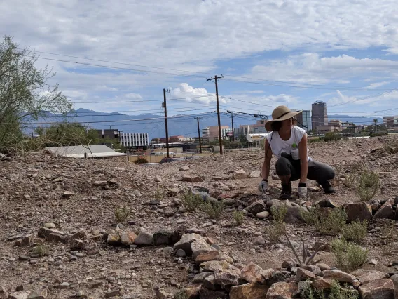 Coverdell Fellows pick weeds at Mission Garden