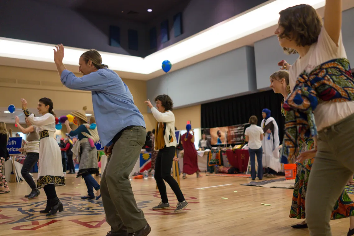 Coverdell Fellows dancing at Peace Corps Fair