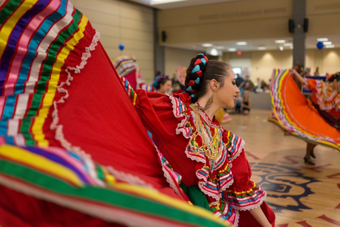 Colorful dress of Mexican folklorico dancer at Peace Corps Fair