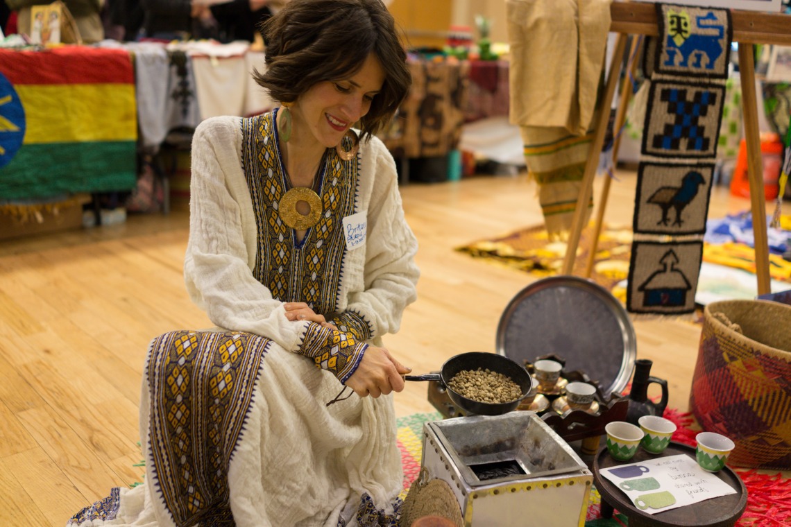 Fellow performing a coffee ceremony at Peace Corps Fair