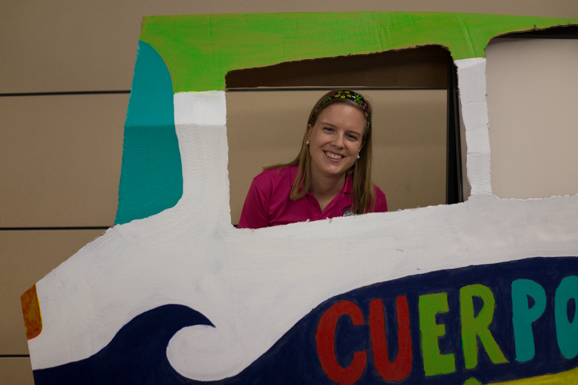 A Fellow in a Central American bus display at Peace Corps Fair