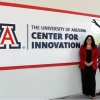 Co-directors in front of Center for Innovation sign